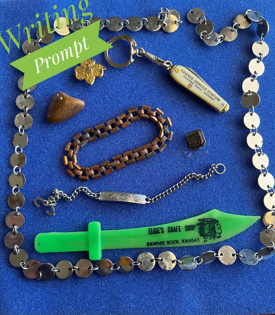 girl scout pin, 4-h pin, pocket knife, two bracelets, polished stone